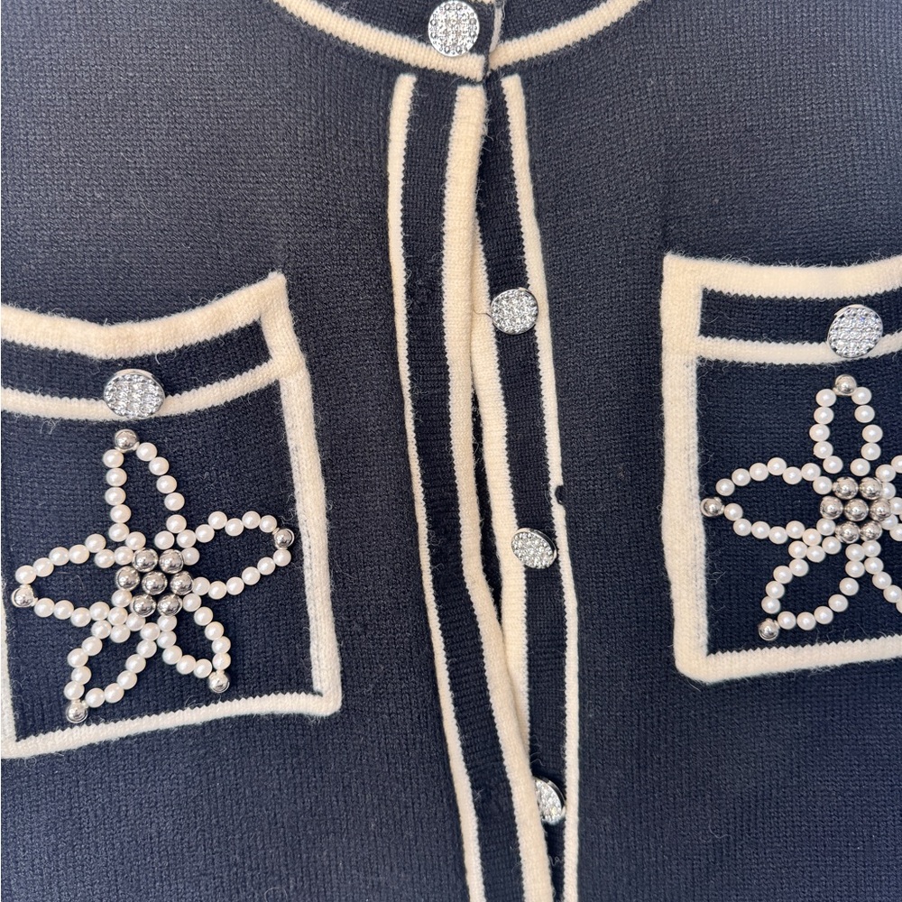 Beulah Black Knit Cardigan with Ivory Trim and Pearl Star Pockets - Picture 6 of 9